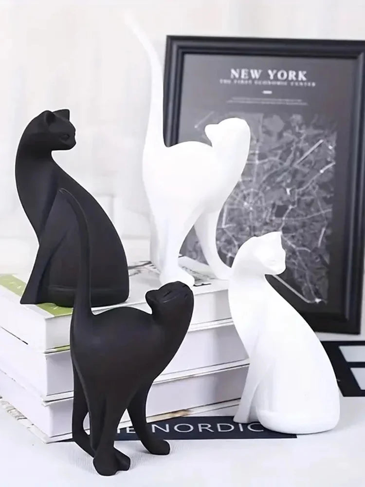 Escultura pareja de gatos decorativa en resina