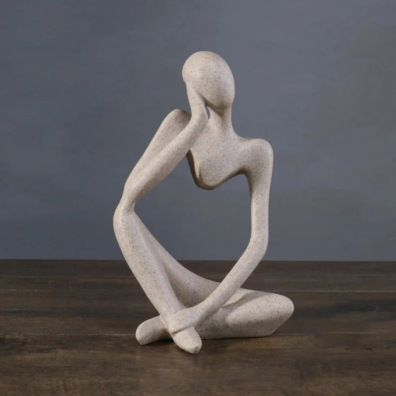 Escultura humana contemplativa minimalista