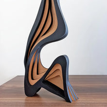 Escultura abstracta de madera minimalista