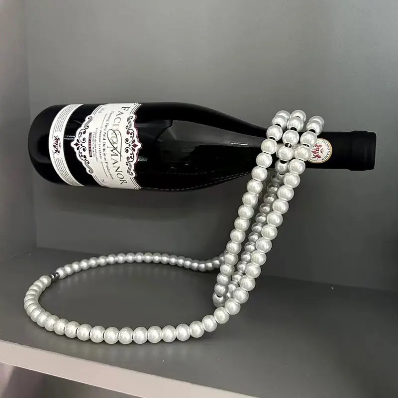 Portavinos decorativo collar de perlas