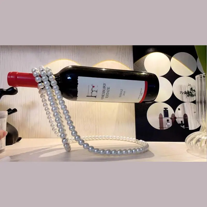 Portavinos decorativo collar de perlas