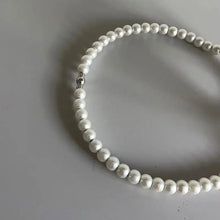 Portavinos decorativo collar de perlas